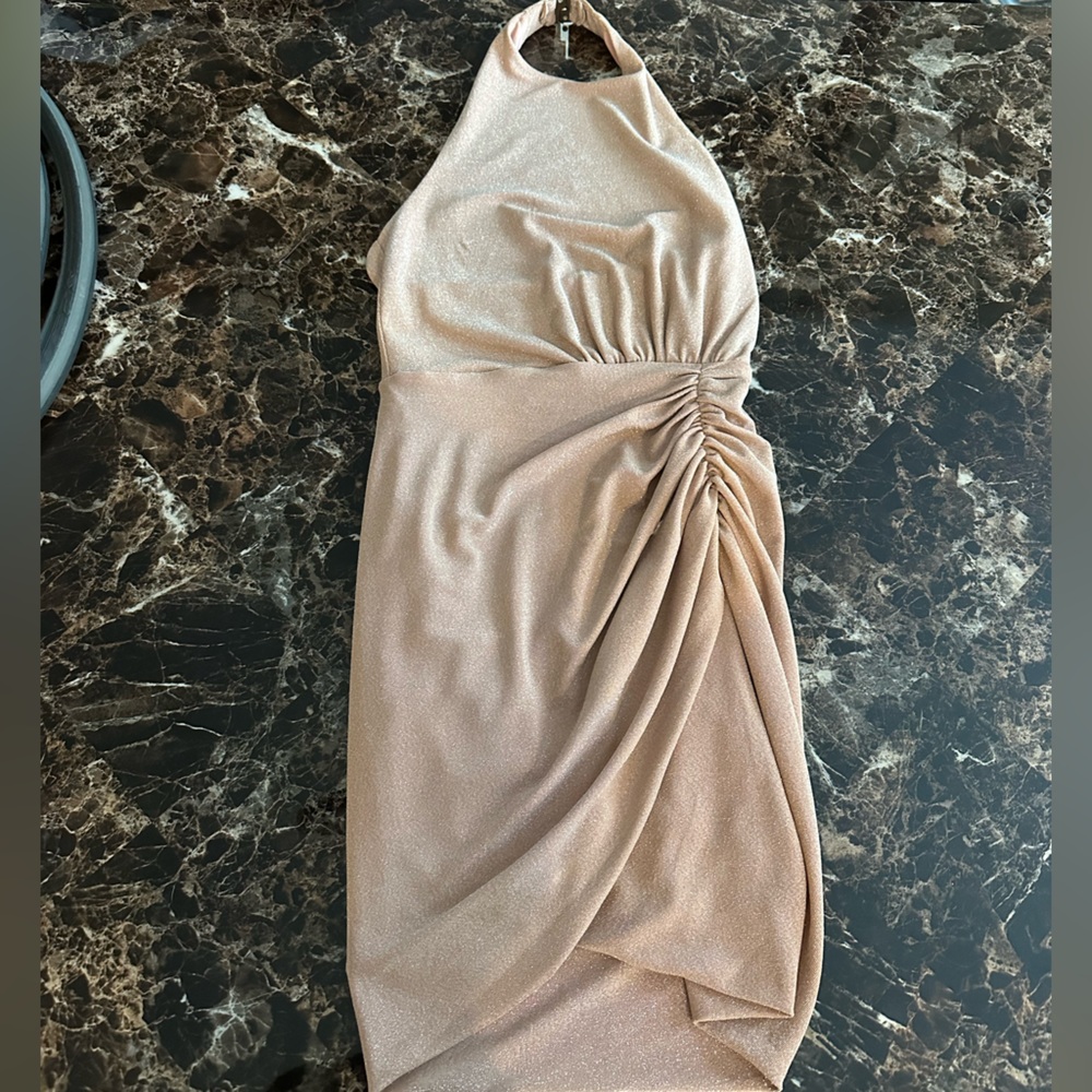 Really nice dress worn once! Size 2 like a champagne color looks gorgeous on